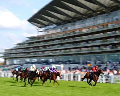Joolianoss ridden by Tom Kiely-Marshall  wins the Ascot Racecourse Supports Debra Manny Mercer Apprentice Handicap at Ascot, in front of the grandstand.